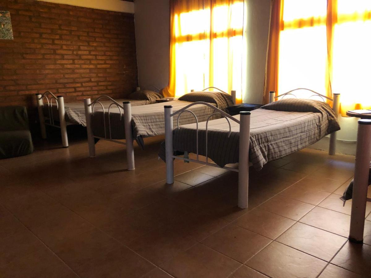 Hostel Bahia Ballenas ปูแอร์โตปีรามีเดส ภายนอก รูปภาพ