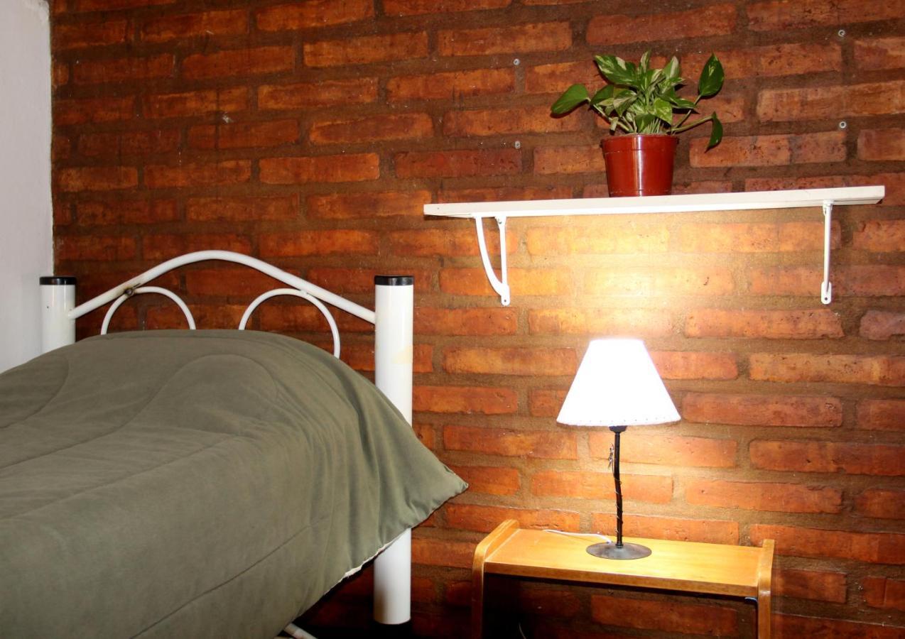 Hostel Bahia Ballenas ปูแอร์โตปีรามีเดส ภายนอก รูปภาพ